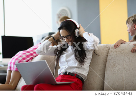 Annoyed lady in room Annoyed lady in room 87043442