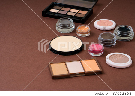Group of cosmetic and makeup products on studio background Group of cosmetic and makeup products on studio background 87052352