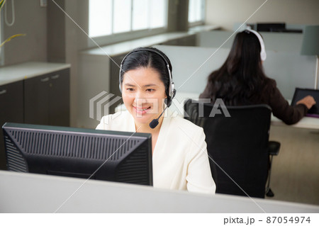 Customer service with friendly, woman call center and operator for support client. 87054974