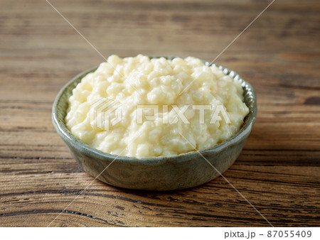 bowl of rice milk pudding bowl of rice milk pudding 87055409