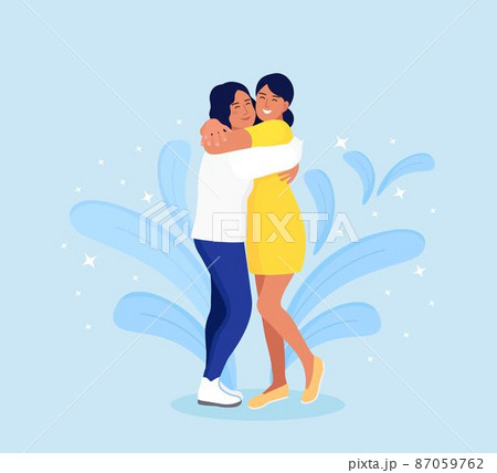 Women hugging each other with a smiling face. Happy meeting of two friends. Friendship, care and love concept 87059762