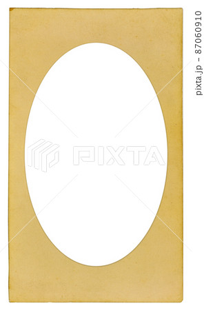 Old cardboard photo frame with ellipse vignette and empty space inside isolated on white background. Mock up 87060910