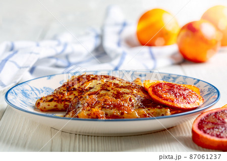 Homemade French pancakes with orange sauce. 87061237