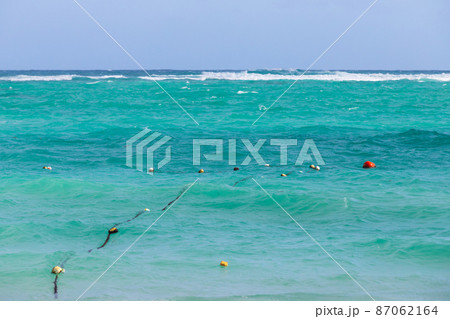 Atlantic ocean, shore water with buoys and ropes 87062164