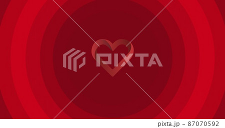 Vector image of heart shape on red circular pattern background with copy space Vector image of heart shape on red circular pattern background with copy space 87070592