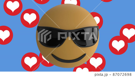 Face wearing sunglasses emoji over multiple red heart icons floating against blue background Face wearing sunglasses emoji over multiple red heart icons floating against blue background 87072698