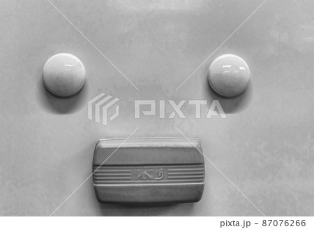 2 magnets and an eraser, on a white board. 2 magnets and an eraser, on a white board. 87076266