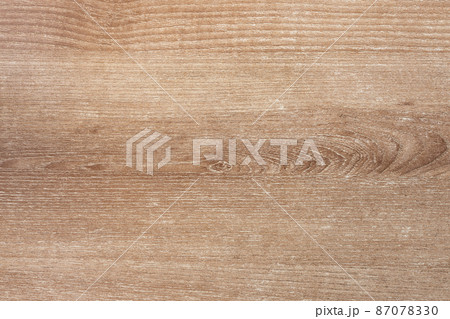 Light brown wooden background top view. Wooden texture closeup. 87078330