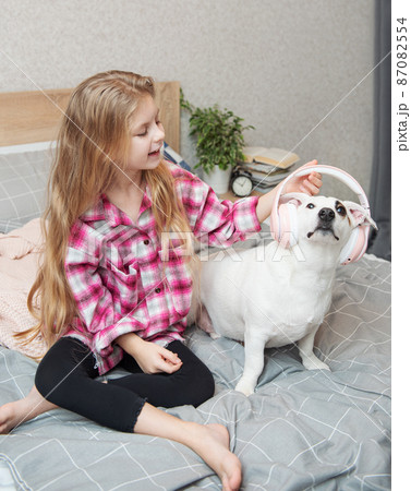 Child girl and dog. Child girl and dog. 87082554
