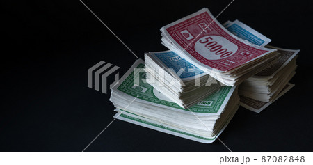 Stack of fake banknotes. 87082848
