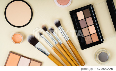 Group of cosmetic and makeup products on studio background Group of cosmetic and makeup products on studio background 87083226