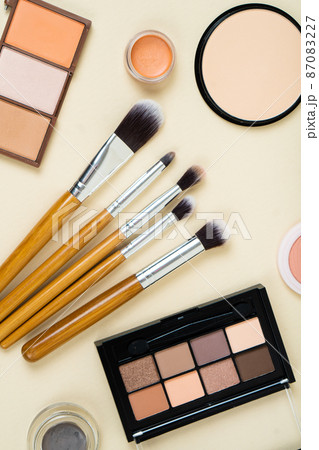 Group of cosmetic and makeup products on studio background Group of cosmetic and makeup products on studio background 87083227