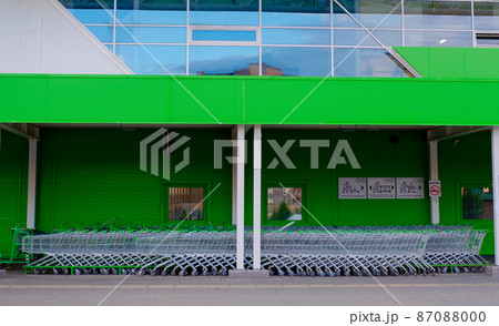 parking for shopping baskets. shopping in the supermarket. parked baskets. empty parking lot. Shopping Baskets for Products in supermarket 87088000
