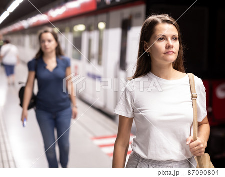 Female waiting for subway train 87090804