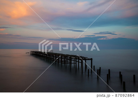 Beautiful dramatic sunset over the old bridge by the sea in Balchik, Bulgaria, Eastern Europe - dawn, dusk 87092864