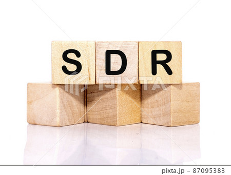SDR text on wooden cubes on a white background SDR text on wooden cubes on a white background 87095383