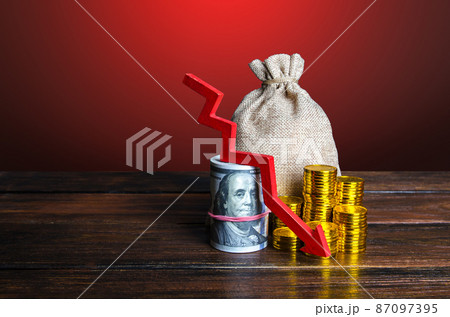 Money with red arrow down. Decreased funds and money. Fall of economy, capital reduction. Lowering in savings and reserves. Inflation. Falling income in GDP. Economic recession, crisis. 87097395