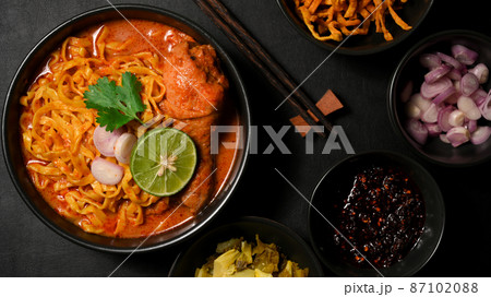 Khao Soi Kai, Unique northern Thai food cuisine served with side dish Khao Soi Kai, Unique northern Thai food cuisine served with side dish 87102088