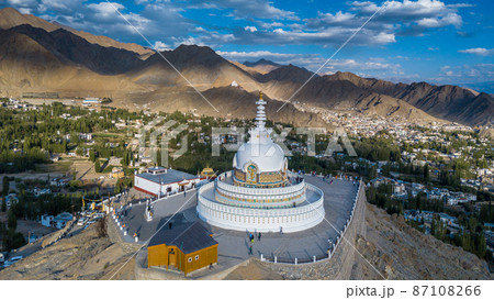 Aerial view Shanti Stupa buddhist white domed stupa overlooks the city of Leh, The stupa is one of the ancient and oldest stupas located in Leh city, Ladakh, Jammu Kashmir, India. 87108266