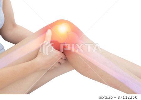 close up young woman massaging her painful knee . Pain relief concept 87112250