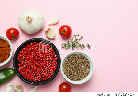 Concept of aromatic spices on pink background Concept of aromatic spices on pink background 87113717