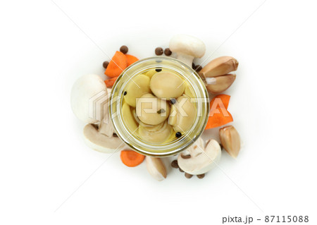 Jar of marinated mushrooms isolated on white background 87115088