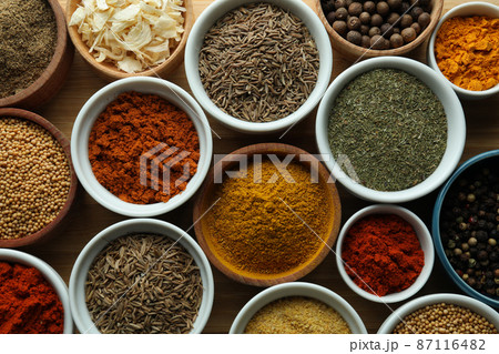 Set of different spices in sauce bowls 87116482