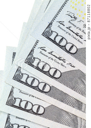 Pile of One Hundred Dollars on white background 87118802