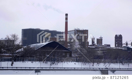 Thermal power plant in Moscow, cooling towers, pipes. Cityscape - industrial area Thermal power plant in Moscow, cooling towers, pipes. Cityscape - industrial area 87125265