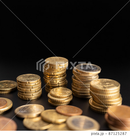 Background of Euro coins on black background. Currency Money. Copy space Background of Euro coins on black background. Currency Money. Copy space 87125287