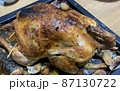 A roasted whole chicken. 87130722