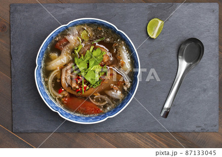 Oxtail soup, traditional muslim food with ox tail puree with spices 87133045