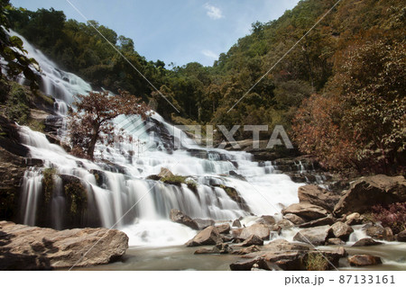Mae Ya Waterfall at Chiangmai, Thailand - Beautiful Scene. Mae Ya Waterfall at Chiangmai, Thailand - Beautiful Scene. 87133161