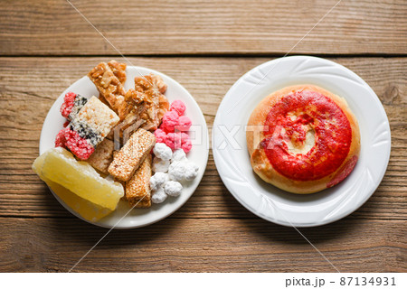 Chinese desserts, Snack mix nuts candies sweets sugar sliced nuts sesame seeds coated beans grains puffed rice candied winter melon, Thai and chinese pay respect to god in chinese new year festival 87134931