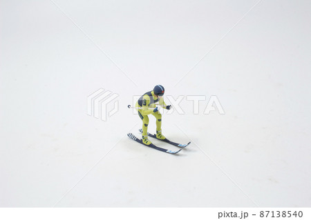 a mini of figure, Skiing. Jumping skier. Extreme winter sports. a mini of figure, Skiing. Jumping skier. Extreme winter sports. 87138540