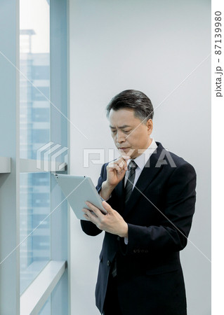 business concept asian korean man, making a long face 87139980
