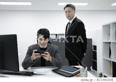 business concept asian korean old and young two men, different generations male man boss and employee concept, using smartphone 87140208