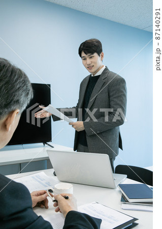 business concept asian korean old and young two men, different generations male man boss and employee concept, explaining about ppt 87140291