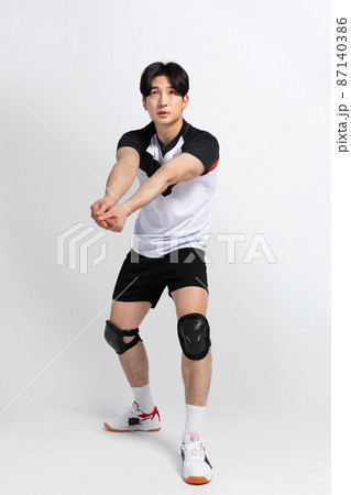 volleyball sports player, asian korean man with toss, tossing motion volleyball sports player, asian korean man with toss, tossing motion 87140386