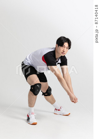 volleyball sports player, asian korean man with toss, tossing motion 87140418