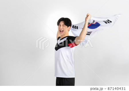 volleyball sports player, asian korean man holding Korean flag Taegeukgi 87140431