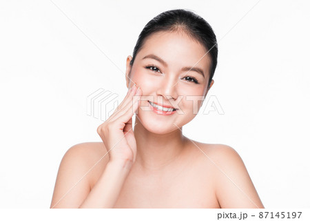 Facial treatment. Beautiful asian woman portrait with perfect skin. Facial treatment. Beautiful asian woman portrait with perfect skin. 87145197