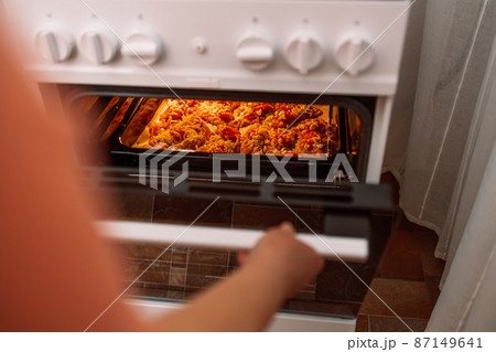 Chicken baked in the oven in glass pan. Homemade food. Chicken baked in the oven in glass pan. Homemade food. 87149641