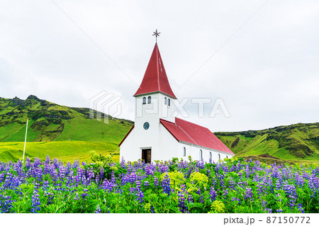 View of Reyniskirkja church on the top of mountain. View of Reyniskirkja church on the top of mountain. 87150772