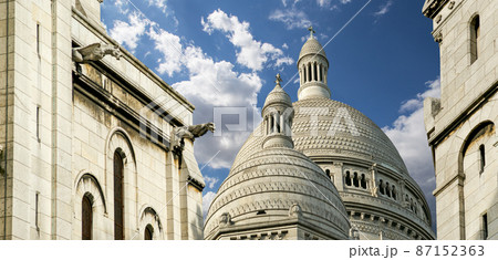 Basilica of the Sacred Heart of Paris, commonly known as Sacre-Coeur Basilica, located in the Montmartre district of Paris, France 87152363