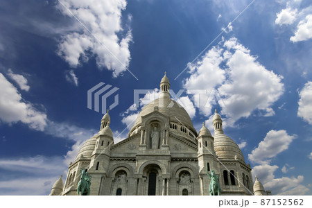 Basilica of the Sacred Heart of Paris, commonly known as Sacre-Coeur Basilica, located in the Montmartre district of Paris, France Basilica of the Sacred Heart of Paris, commonly known as Sacre-Coeur Basilica, located in the Montmartre district of Paris, France 87152562