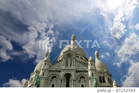 Basilica of the Sacred Heart of Paris, commonly known as Sacre-Coeur Basilica, located in the Montmartre district of Paris, France 87152563
