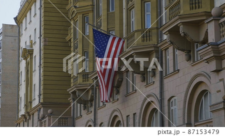 Wrapped around flagpole flag of the USA in Russia Moscow Wrapped around flagpole flag of the USA in Russia Moscow 87153479