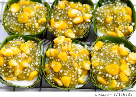 Thai dessert coconut pudding with tapioca pearl or sago and corn 87156235