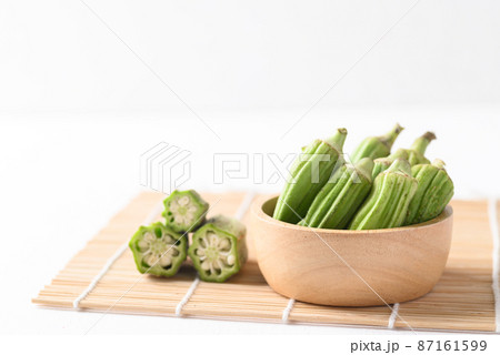 Green okra or ladies fingers (Edible green seed pods), Organic vegetables from local farmer market Green okra or ladies fingers (Edible green seed pods), Organic vegetables from local farmer market 87161599